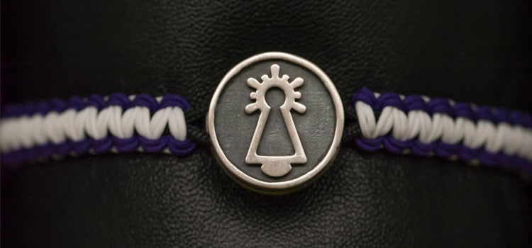 PULSERA COFRADE MORADA Y BLANCA