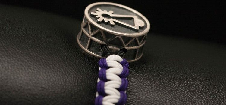 PULSERA COFRADE MORADA Y BLANCA
