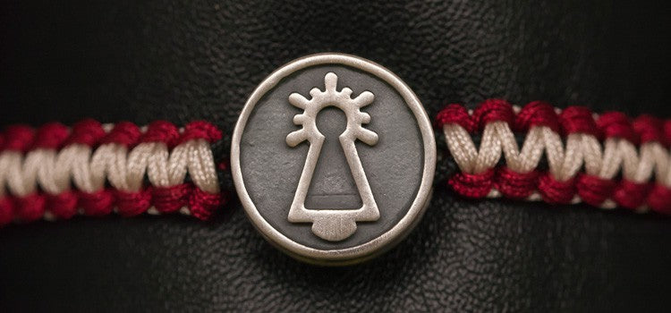 PULSERA COFRADE GRANATE