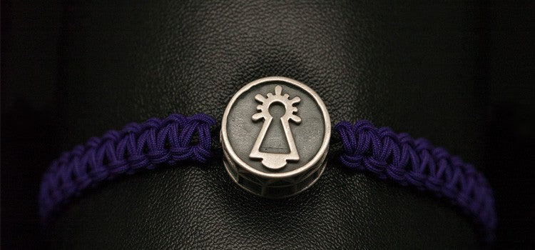 PULSERA COFRADE MORADA